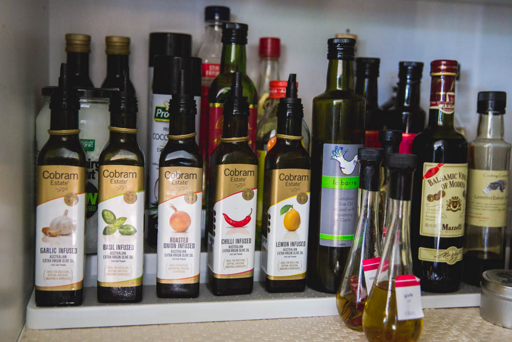 bottles on a tiered shelf